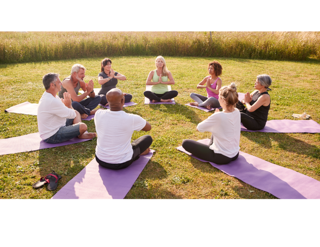 People sitting in a circle on yoga mats for retreat in Midlothian VA